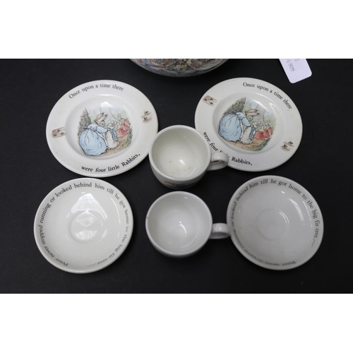 5257 - Assortment to include, Wedgwood Peter Rabbit Lidded jug, Cups and saucers, Poole Pottery The Mad Hat... 