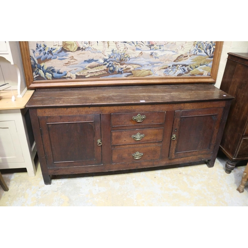 2011 - Antique 18th century English Georgian oak dresser base, three central graduating drawers, flanked by... 