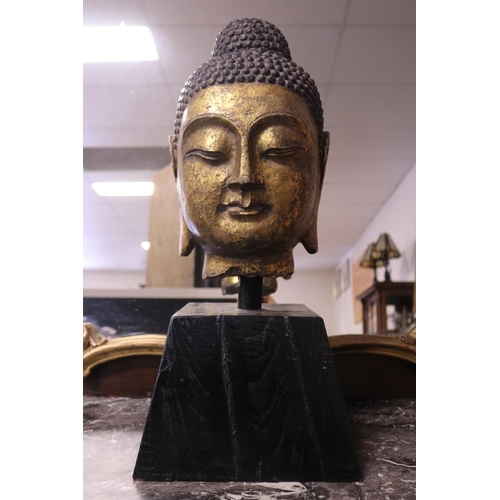 2078 - Large gilt carved stone Buddha head, South East Asian, mounted on square tapering base, total approx... 