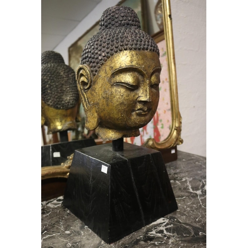 2078 - Large gilt carved stone Buddha head, South East Asian, mounted on square tapering base, total approx... 