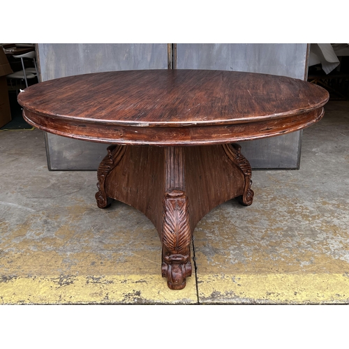 2265 - American oak finished circular dining table walnut colour, in the Empire style, approx 78cm H x 140c... 