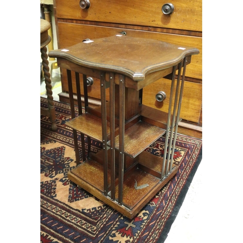 2035 - Antique Edwardian small scale revolving bookcase, brass and China castors, approx 64cm H x 41cm sq