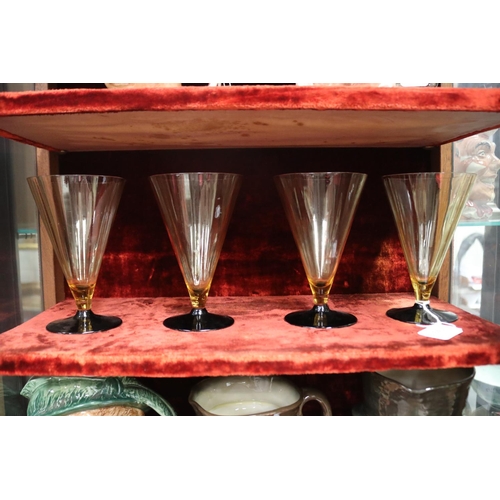 2149 - Set of four vintage amber and red glass base wine glasses, AF, each approx 15cm H x 9.5cm dia (4)