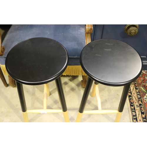 2256 - Pair of wooden stools, each approx 66cm H x 34cm dia (2)