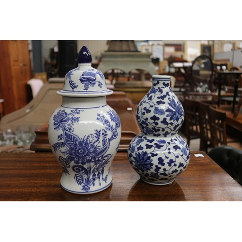 2270 - Two modern decorative blue & white vases, approx 29cm H and shorter (2)