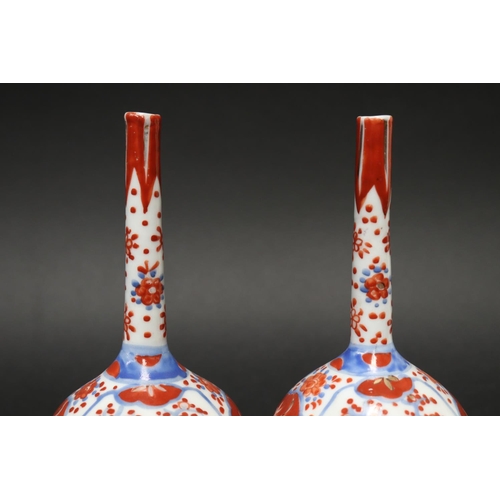 11 - Pair of antique small Japanese Imari bottle vases, each approx 16 cm H (2)