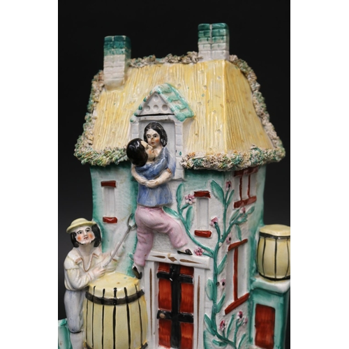21 - Victorian large Staffordshire group of lovers at a window with father below, approx 31cm H x 19cm W