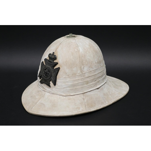 69 - First World War British Army Wolseley pattern pith helmet, with leather headband marked E.Z. Bloomfi... 