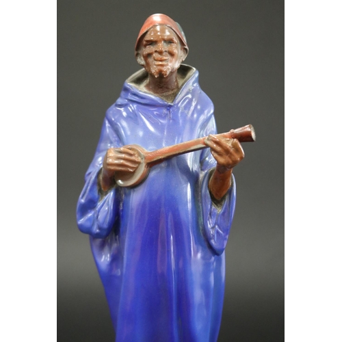 211 - Rare Royal Doulton, Moorish Minstrel in blue, approx 33.5cm H x 9cm W x 9cm D