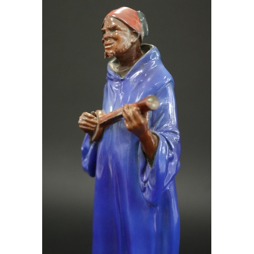 211 - Rare Royal Doulton, Moorish Minstrel in blue, approx 33.5cm H x 9cm W x 9cm D