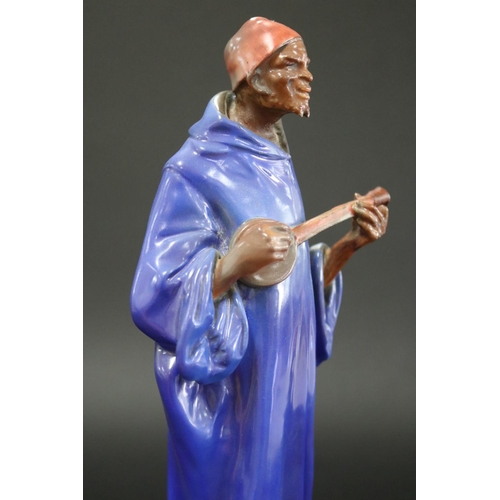 211 - Rare Royal Doulton, Moorish Minstrel in blue, approx 33.5cm H x 9cm W x 9cm D