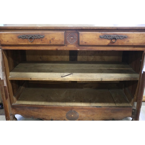 256 - Antique early 19th century French buffet, with two doors and two top drawers, approx 104cm H x 141cm... 