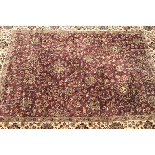 327 - Large good quality Indian wool carpet of autumn tone, approx 272cm x 363cm