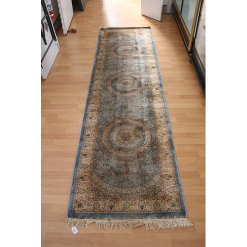 366 - Fine pale blue ground silk carpet, approx 79cm x 290cm