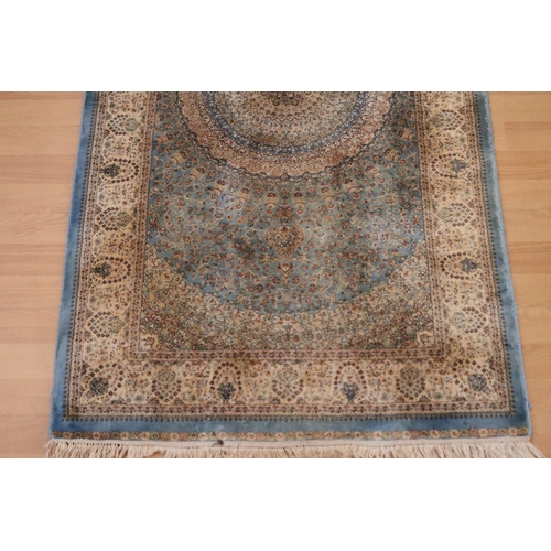 366 - Fine pale blue ground silk carpet, approx 79cm x 290cm