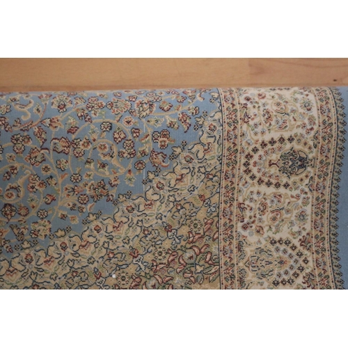 366 - Fine pale blue ground silk carpet, approx 79cm x 290cm