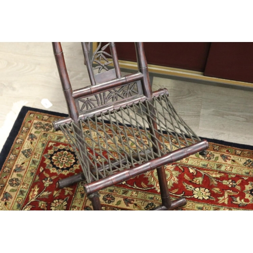 298 - Vintage Chinese faux bamboo hardwood silver inlaid folding child's chair, with woven cord seat secti... 