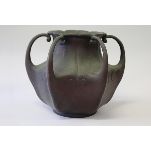 292 - Unusual Japanese bronze six handled vase, in the organic form, approx 25cm H x 29cm W