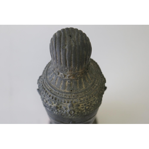 295 - South East Asian bronze Buddha head on carved turned wood stand, approx 32cm H including stand