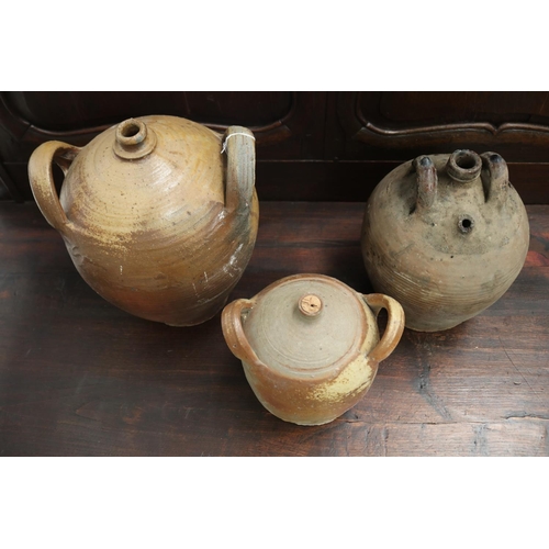 421 - Three antique French twin handled stoneware pots, approx 31cm H and shorter (3)