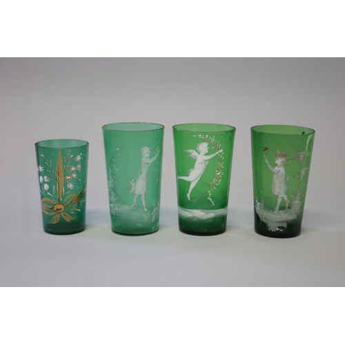219 - Four antique Mary Gregory dark green beakers (4)