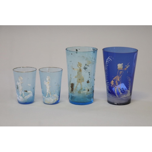 222 - Four antique Mary Gregory blue glass beakers (4)