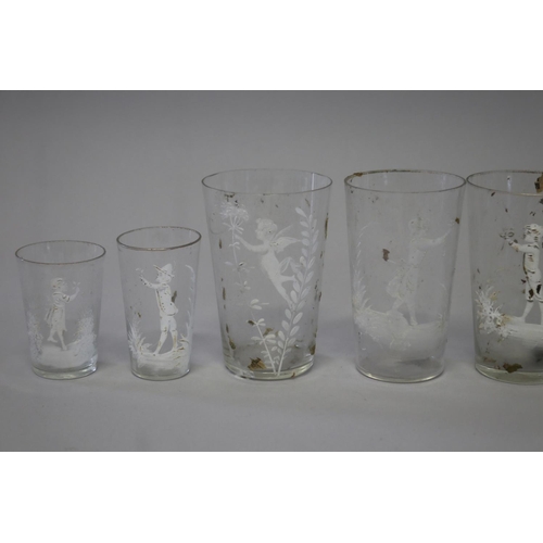 226 - Collection of eight antique Mary Gregory clear glass beakers (8)