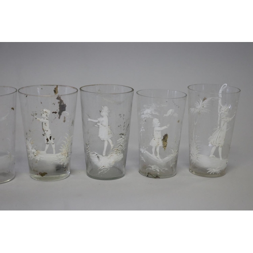 226 - Collection of eight antique Mary Gregory clear glass beakers (8)