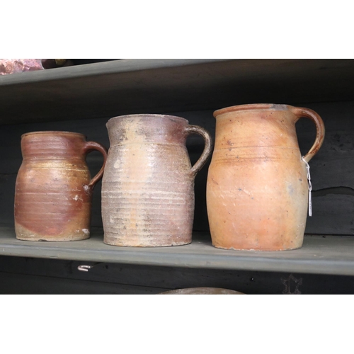 318 - Lot of three antique French stoneware jugs, approx 22cm H and shorter (3)