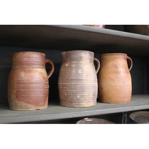 318 - Lot of three antique French stoneware jugs, approx 22cm H and shorter (3)