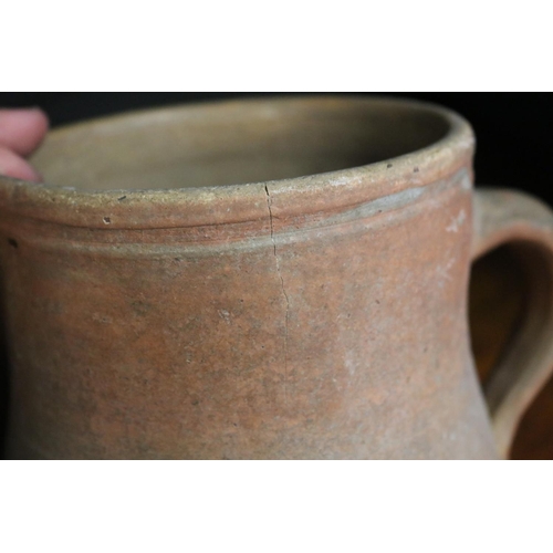 321 - Three antique French stoneware jugs, approx 27cm H and shorter (3)