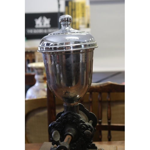 335 - Antique French coffee grinder, with ornate base, mounted to wooden drawer, approx 48cm H