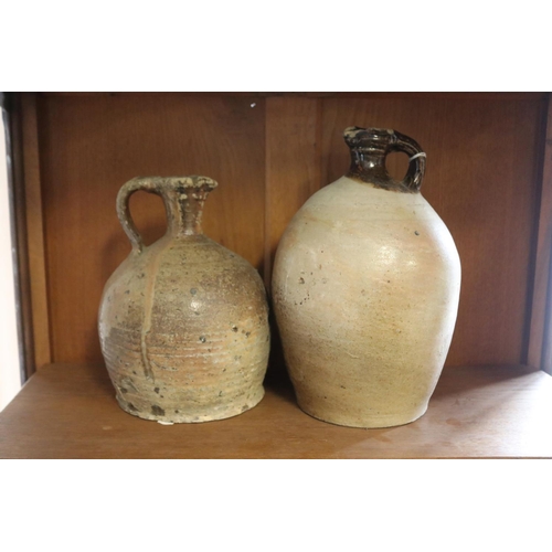 346 - Two antique French stoneware jugs, approx 28cm H and shorter (2)