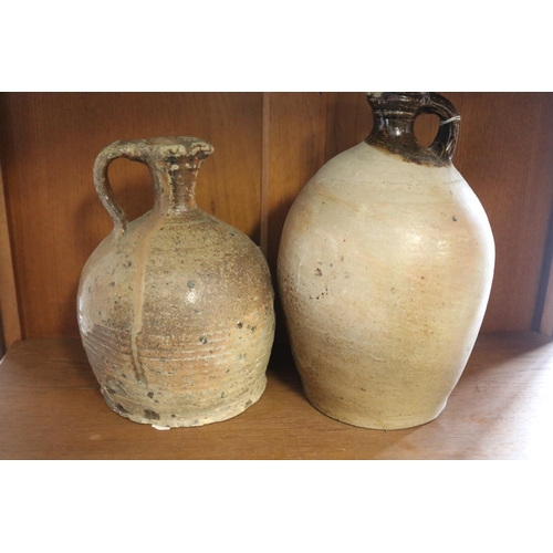 346 - Two antique French stoneware jugs, approx 28cm H and shorter (2)