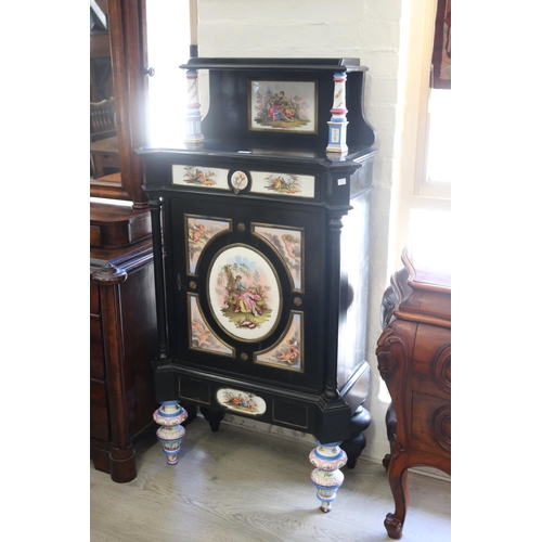 351 - Antique Continental, most likely German, ebonized cabinet with porcelain panels  legs,  brass mounts... 