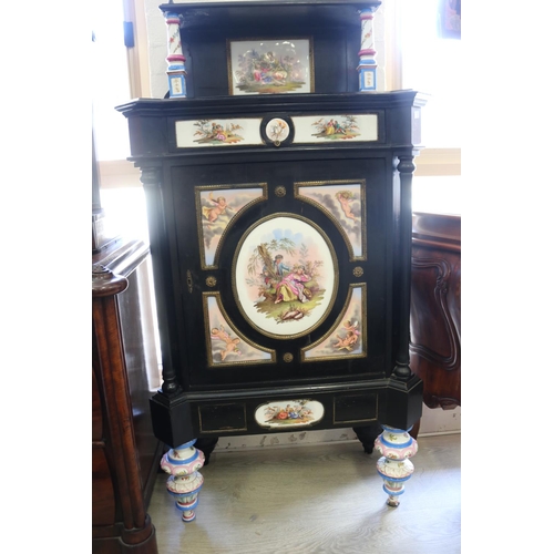 351 - Antique Continental, most likely German, ebonized cabinet with porcelain panels  legs,  brass mounts... 