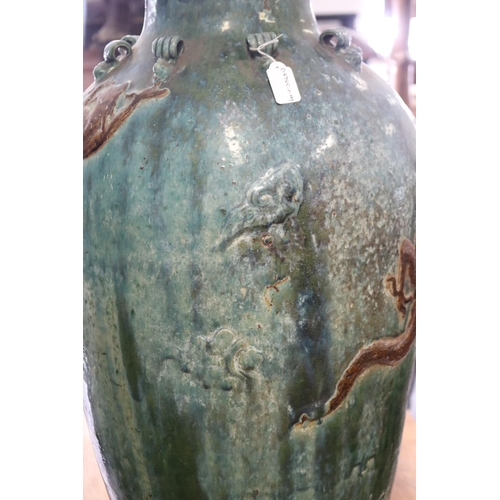 268 - Large antique mataban green glazed storage vase, with brown dragon in relief. approx 90 cm high. Rop... 