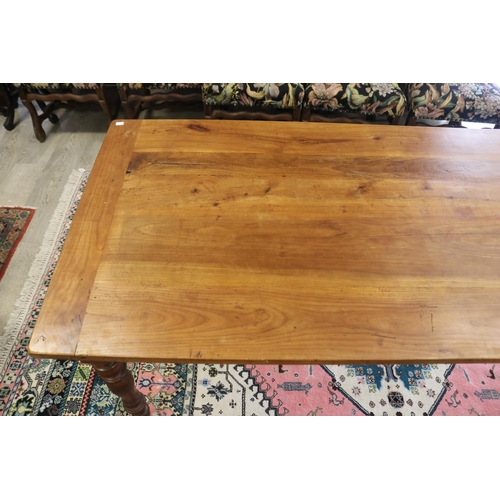 306 - Antique 19th century French fruitwood country table, standing on turned legs, with single cutlery dr... 