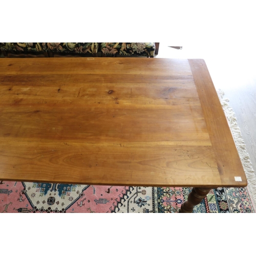 306 - Antique 19th century French fruitwood country table, standing on turned legs, with single cutlery dr... 
