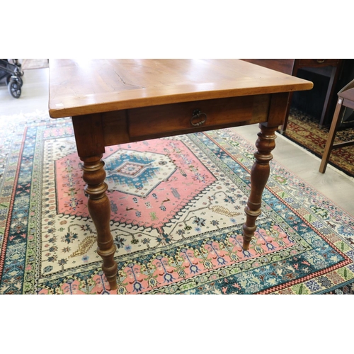 306 - Antique 19th century French fruitwood country table, standing on turned legs, with single cutlery dr... 