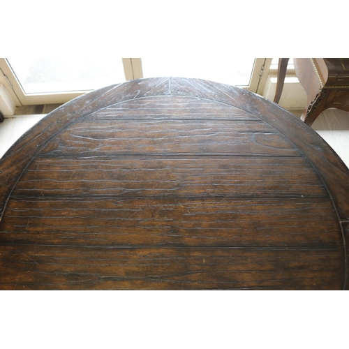 326 - Antique style circular wooden topped dining table with wrought iron base, approx 76cm H x 142cm Dia