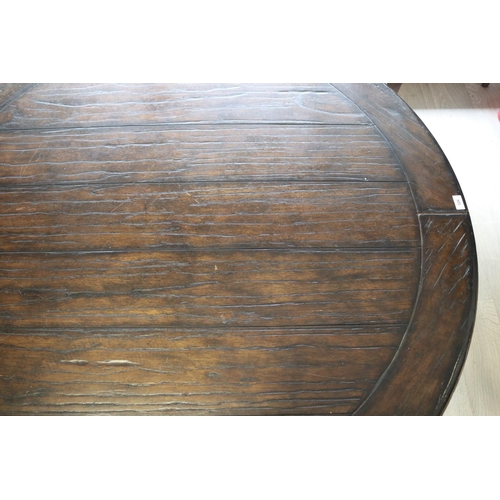 326 - Antique style circular wooden topped dining table with wrought iron base, approx 76cm H x 142cm Dia