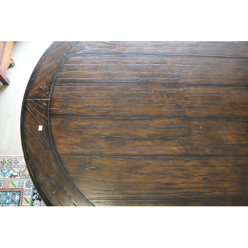 326 - Antique style circular wooden topped dining table with wrought iron base, approx 76cm H x 142cm Dia