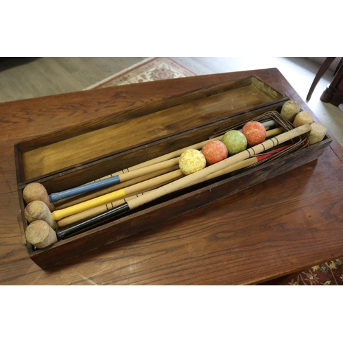 376 - French croquet set in original wooden box, box approx 13cm H x 89cm W (ex handles) x 20cm D