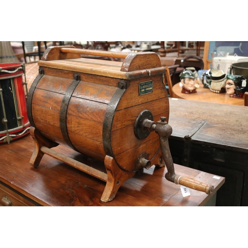 393 - Antique French butter churn, label to front, approx 48cm H x 68cm W including handle