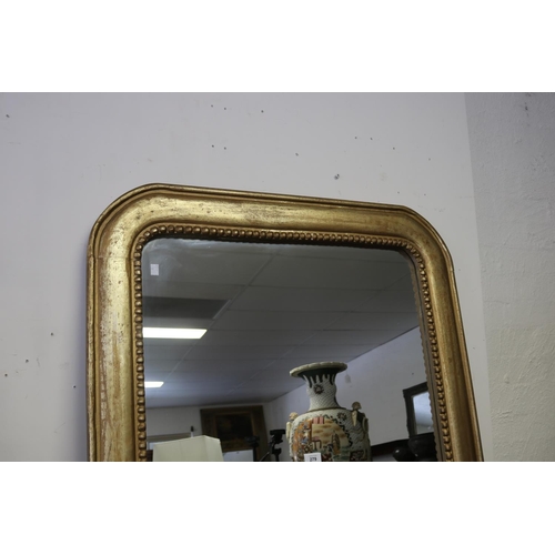 279 - Antique style gilt painted frame mirror, arched design, approx 129cm x 91cm