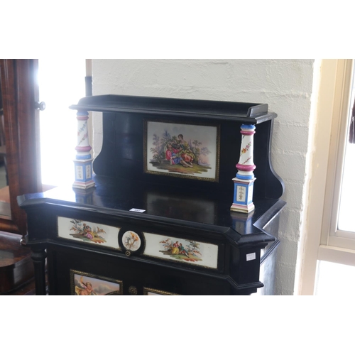 351 - Antique Continental, most likely German, ebonized cabinet with porcelain panels  legs,  brass mounts... 