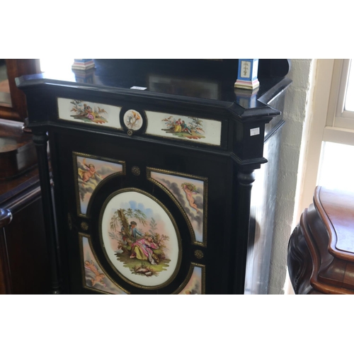 351 - Antique Continental, most likely German, ebonized cabinet with porcelain panels  legs,  brass mounts... 