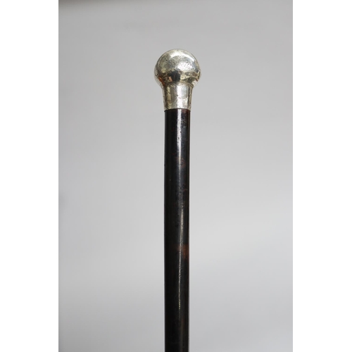 11 - Ebonised walking stick with ball form finial, approx 91cm L