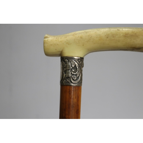13 - Walking stick with silver and carved bone handle, approx 89cm L
